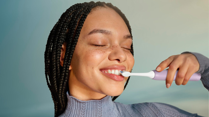 Philips Sonicare 3100 Series HX4033/27 Luxe Lila product in gebruik