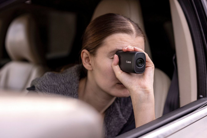 Canon Powershot Zoom Black product in use