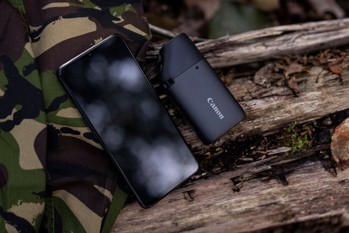 Canon Powershot Zoom Black product in use