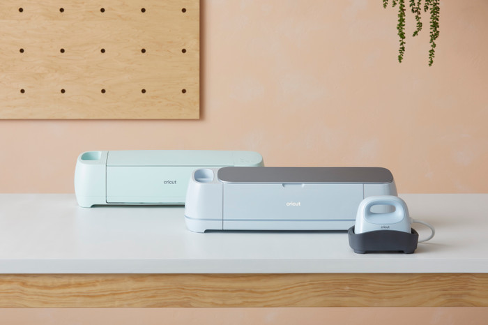 Cricut Explore 4 Essentials bundle + hat press product in use