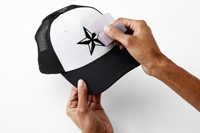 Cricut Explore 4 Essentials bundle + hat press product in use