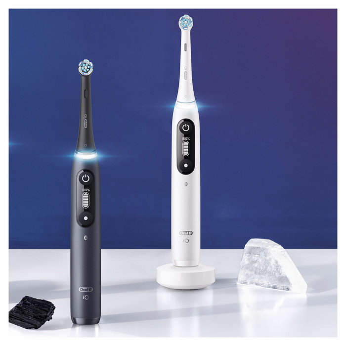 Oral-B iO Series 7w Black with Extra Brush Attachment product in use