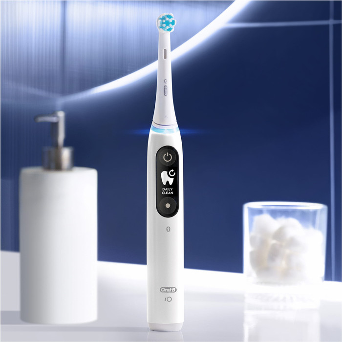 Oral-B iO Series 6N White + Extra iO Gentle Care Brush Attachment product in use