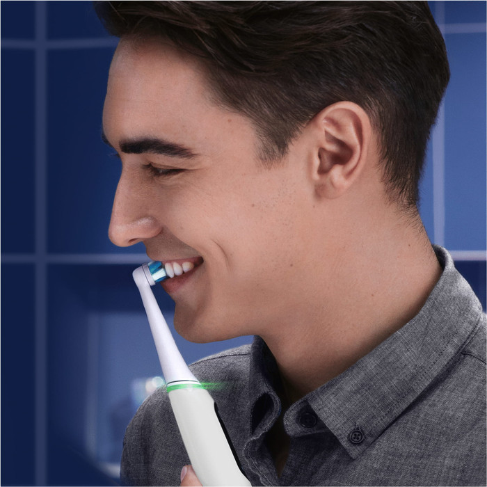 Oral-B iO Series 6N White + Extra iO Gentle Care Brush Attachment product in use
