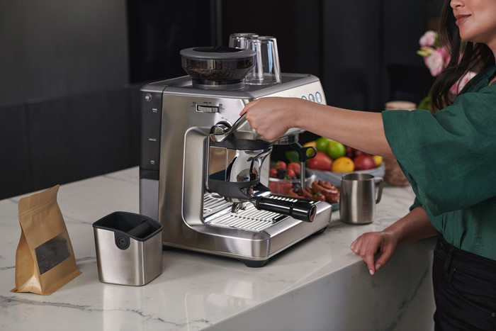 Sage Barista Express Impress Brushed Stainless Steel + Knock Box product in use