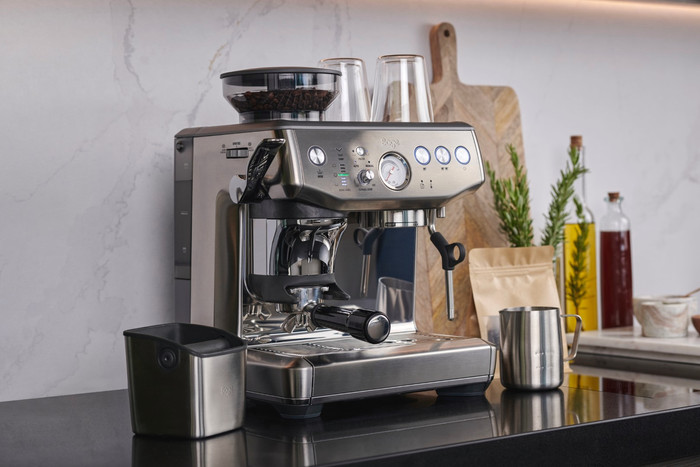 Sage Barista Express Impress Brushed Stainless Steel + Knock Box product in use