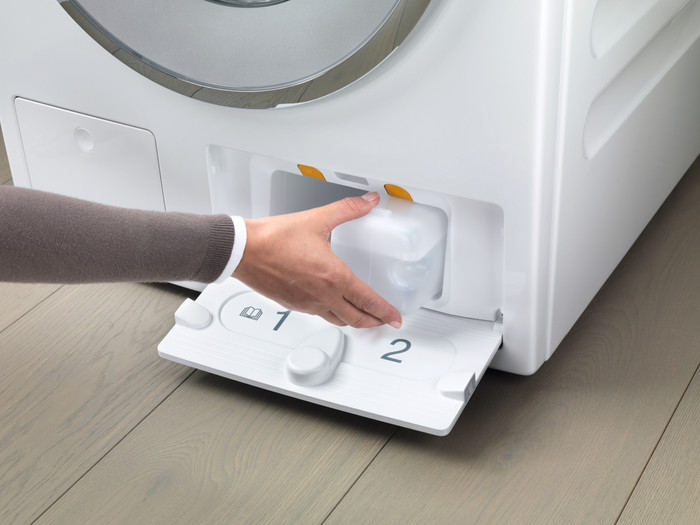 Miele dispenser TwinDos Care product in gebruik