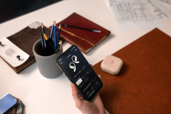 Shokz OpenFit Cream product in use