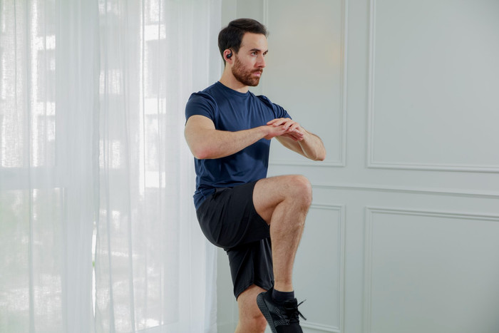 Shokz OpenFit Cream product in use