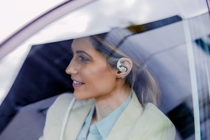 Shokz OpenFit Cream product in use