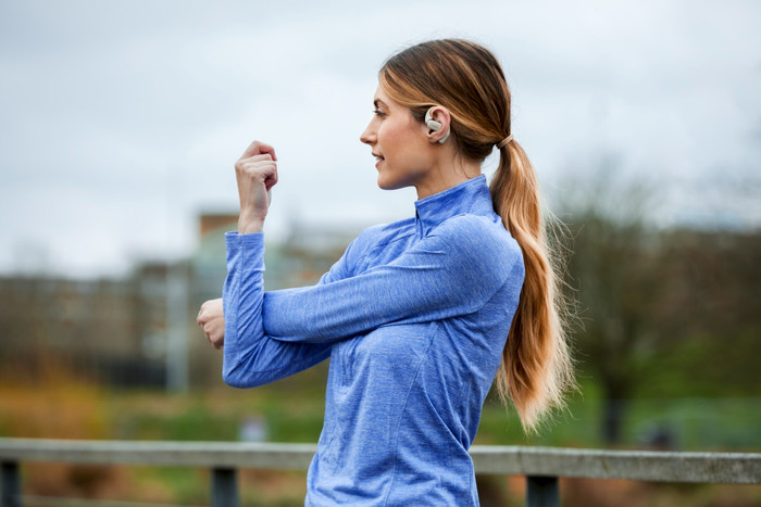 Shokz OpenFit Cream product in use