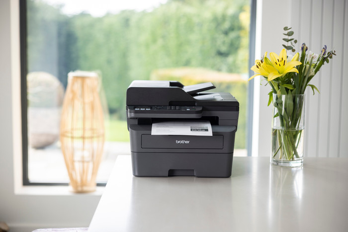 Brother MFC-L2860DWE product in use