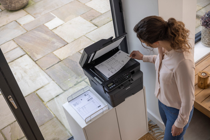 Brother MFC-L2860DWE product in use