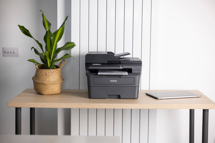 Brother MFC-L2860DWE product in use
