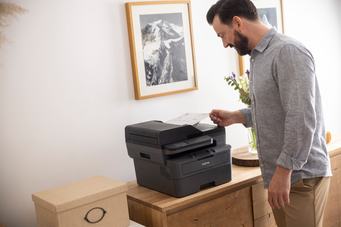 Brother MFC-L2860DWE product in use