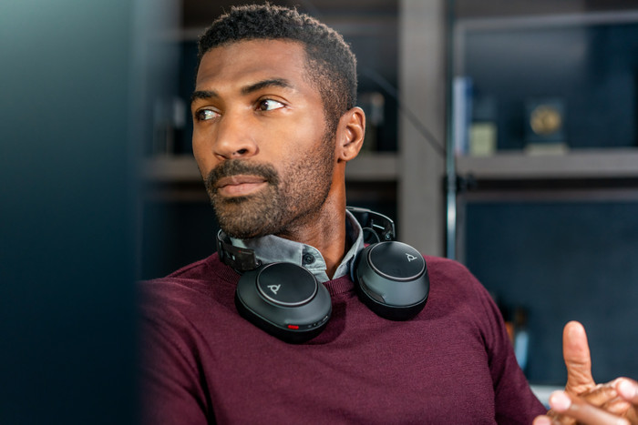 Poly Voyager Surround 80 UC Office Headset product in use