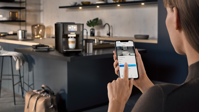 Siemens EQ700 Classic Piano Black TP713R09 product in use