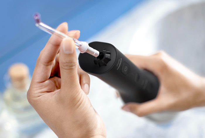 Philips Sonicare DiamondClean 9000 HX3886/43 + Power Flosser Black product in use