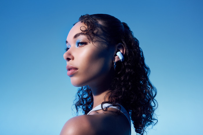 Bose Ultra Open Earbuds Light Blue product in use