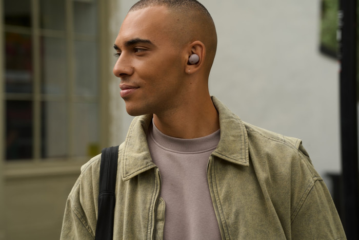 Sony WF-1000XM5 Pink product in use