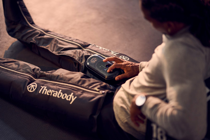 Therabody JetBoots Prime Medium product in use