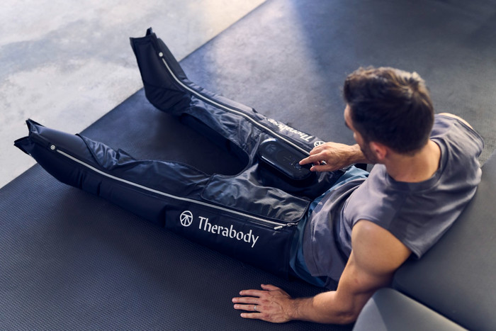 Therabody JetBoots Prime Medium product in use