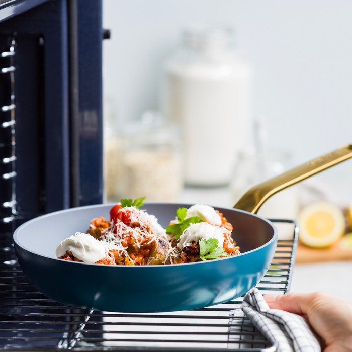 GreenPan Evolution Frying Pan 24cm Blue product in use