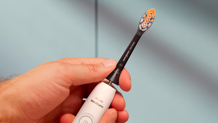 Philips Sonicare Premium All-in-One HX9094/88 Zwart (4 stuks) product in gebruik