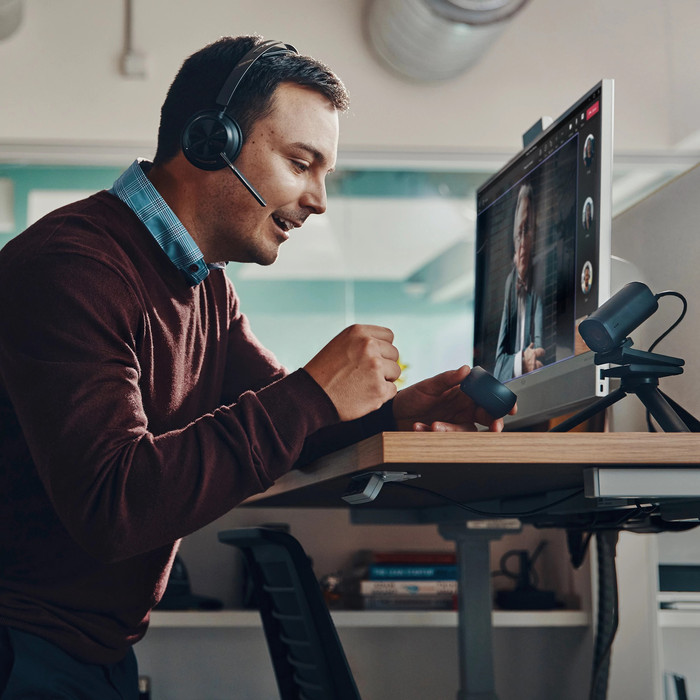 Poly Voyager Focus 2 MS Wireless Office Headset product in use