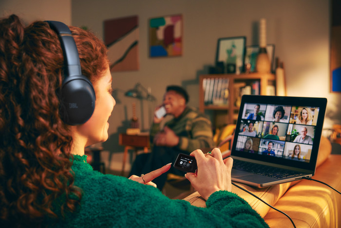 JBL Tour One M3 Smart TX Blue product in use