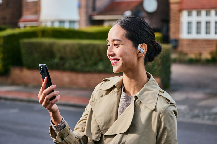 Shokz OpenFit 2+ Gray product in use