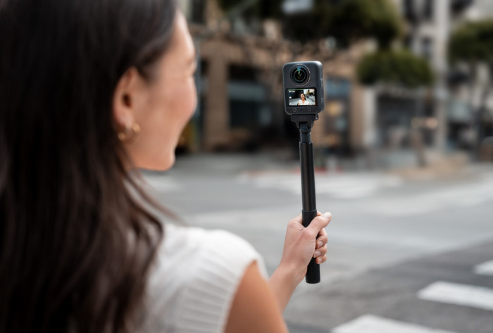 DJI Osmo 1.2m Invisible Selfie Stick + Magnetic Quick Release Mount product in use