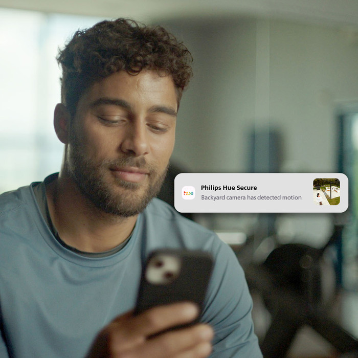 Philips Hue Secure Cam 2K Wired White product in use