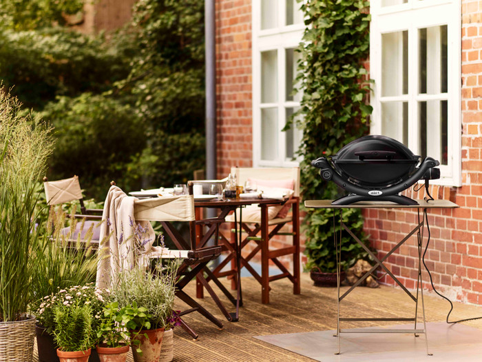 Weber Q1400 + Weber Luxe Hoes Série Q1000 produit à l'usage