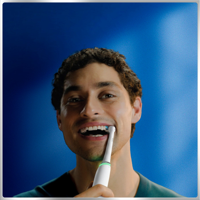 Oral-B iO Series 6N White + Extra iO Gentle Care Brush Attachment product in use