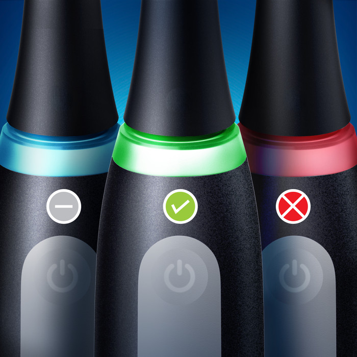 Oral-B iO 3N Black and Pink Duo Pack product in use