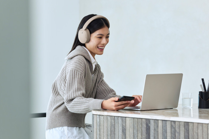 Sony WH-CH735N Cream product in use