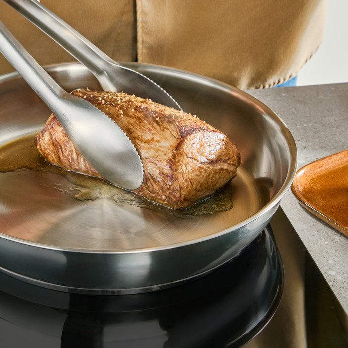 Tefal Extreme koekenpannenset 24/28 cm product in gebruik