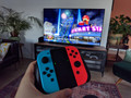 Nintendo Switch Rood&#x2F;Blauw + Mario Kart 8 Deluxe + BlueBuilt Beschermhoes (Afbeelding 3 van 4)