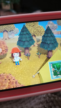 Nintendo Switch Lite Coral + Animal Crossing + 12 months of Nintendo Switch Online (Image 1 of 4)