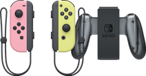 Nintendo Switch Joy-Con Pastel Set Roze/Geel + Nintendo Switch Joy-Con Charge Grip 