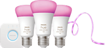 Philips Hue White and Color Kit de Démarrage E27 Lot de 3 + Solo Lightstrip 3 m Kit de démarrage pour ampoule connectée compatible avec l'Assistant Google