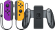 Nintendo Switch Set Joy-Con Mauve Néon/Orange Néon + Nintendo Switch Support de Recharge Joy-Con Main Image